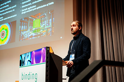 Dr. Bálint Batki from the Norwegian Nuclear Research Center presents on AI, data, and robotics to accelerate nuclear deployment during the fusion–fission synergy session at the binding.energy conference