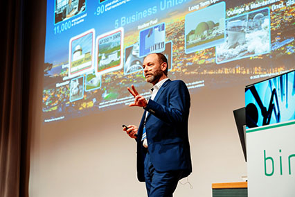 Dr. Martin Pache, Managing Director at Westinghouse Germany, presents his visionary talk "(R)Evolution in Nuclear Energy" on advanced nuclear reactor concepts during binding.energy’s fission session