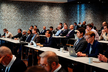 International nuclear experts attentively follow a presentation during a conference session at binding.energy, held in the modern conference rooms of Eurogress Aachen