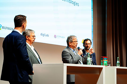 Fusion experts Prof. Dr. Markus Roth (Focused Energy), Richard Kembleton (Gauss Fusion), and Prof. Dr. Frank Jenko (Max-Planck-Institut für Plasmaphysik) in high-level panel discussion at binding.energy conference on fusion technology innovations