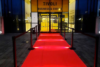Entrance to the binding.energy nuclear industry conference at Eurogress Aachen with Tivoli stadium nearby, hosting the business networking dinner